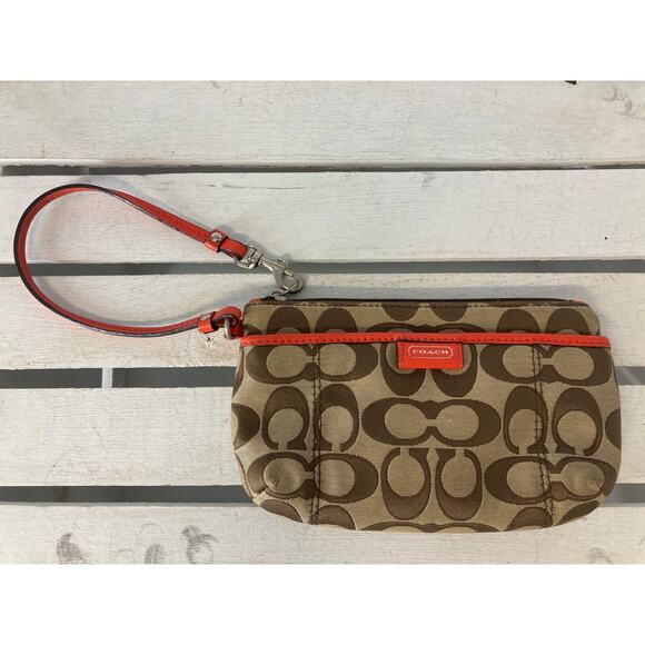 COACH SMALL SIGNATURE PRINT CANVAS, ORANGE TRIM WRISTLET. - Picture 1 of 11